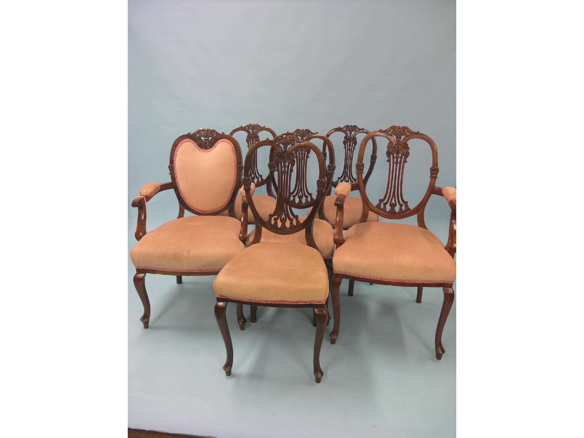 Appraisal: A late Victorian mahogany drawing room suite consisting of two-seater