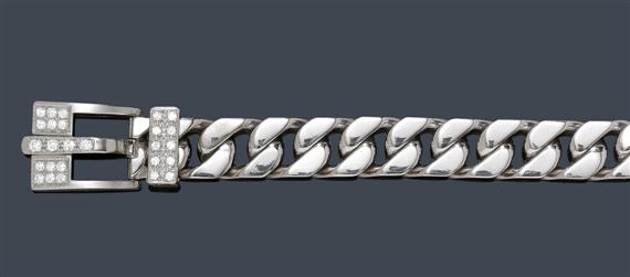 Appraisal: GOLD AND DIAMOND BRACELET White gold g Decorative solid curb