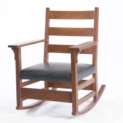 Appraisal: GUSTAV STICKLEY Rocker with three horizontal backslats and a tacked-on