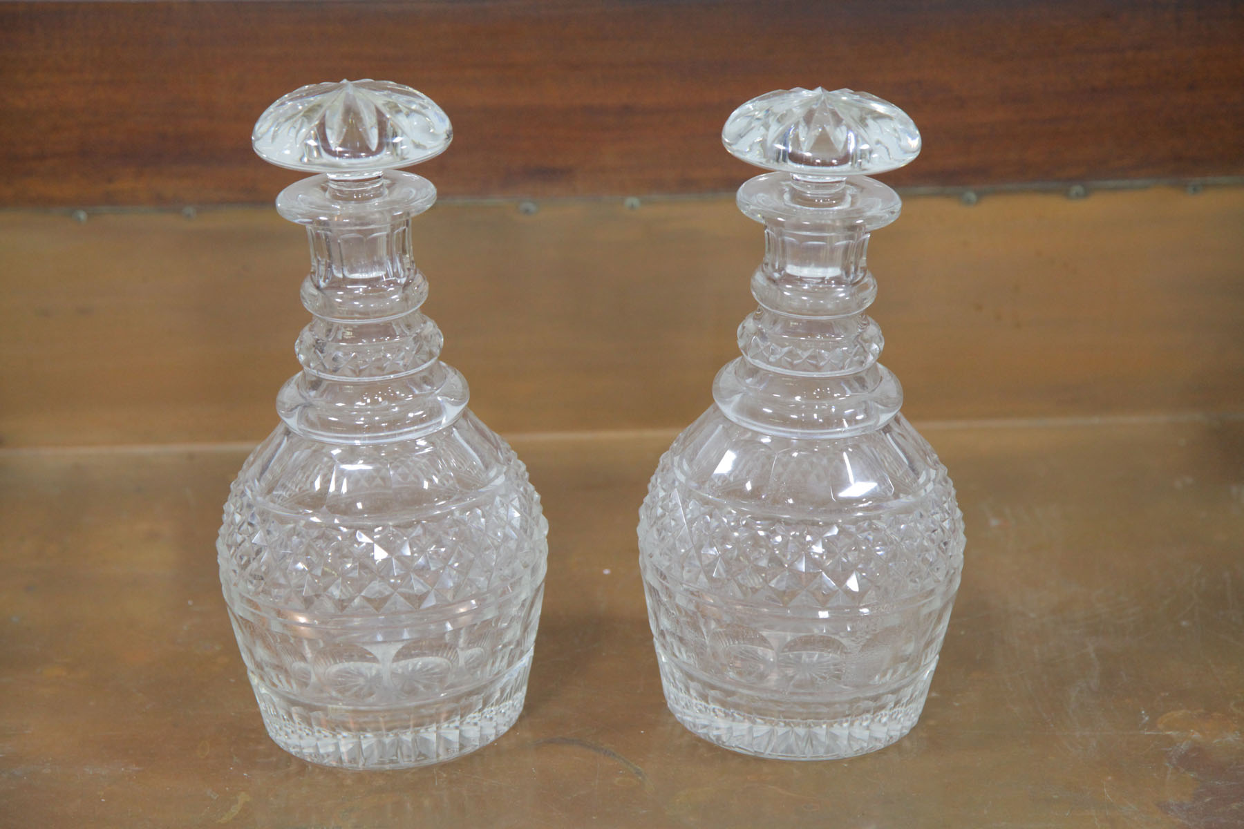 Appraisal: PAIR OF CUT GLASS DECANTERS American th century Stoppered decanters