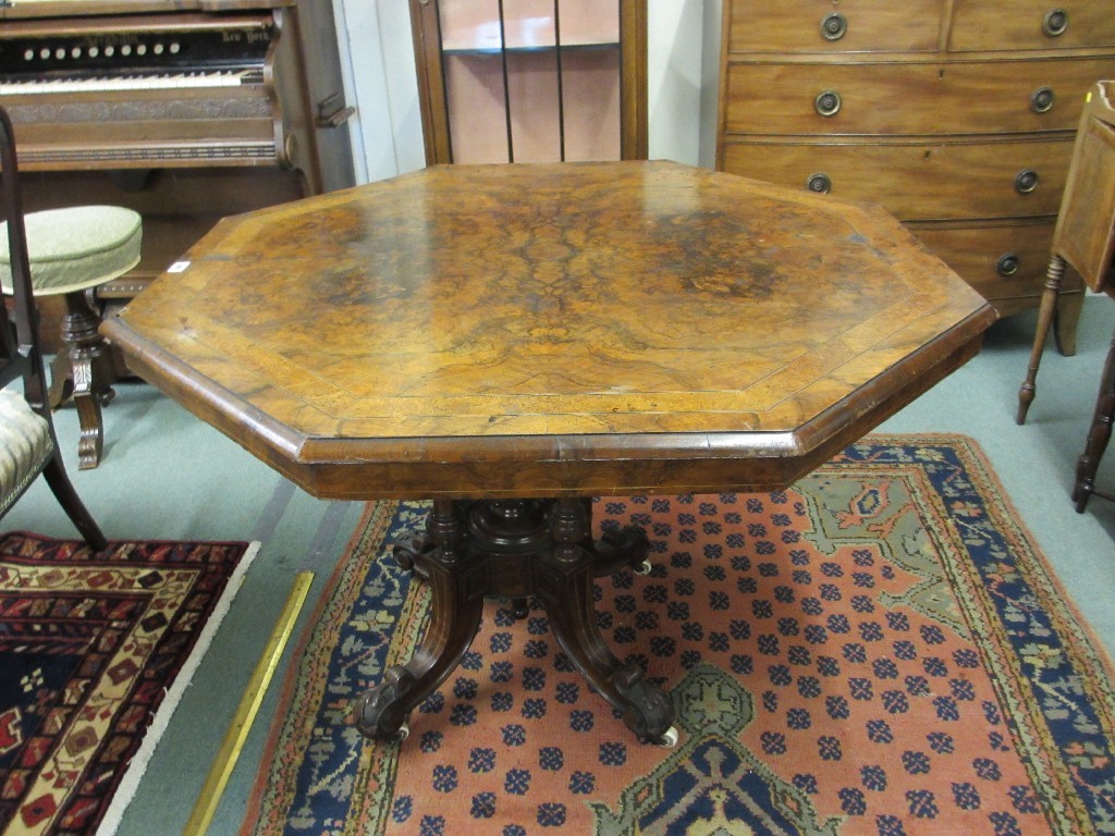 Appraisal: Victorian walnut octagonal snap top table