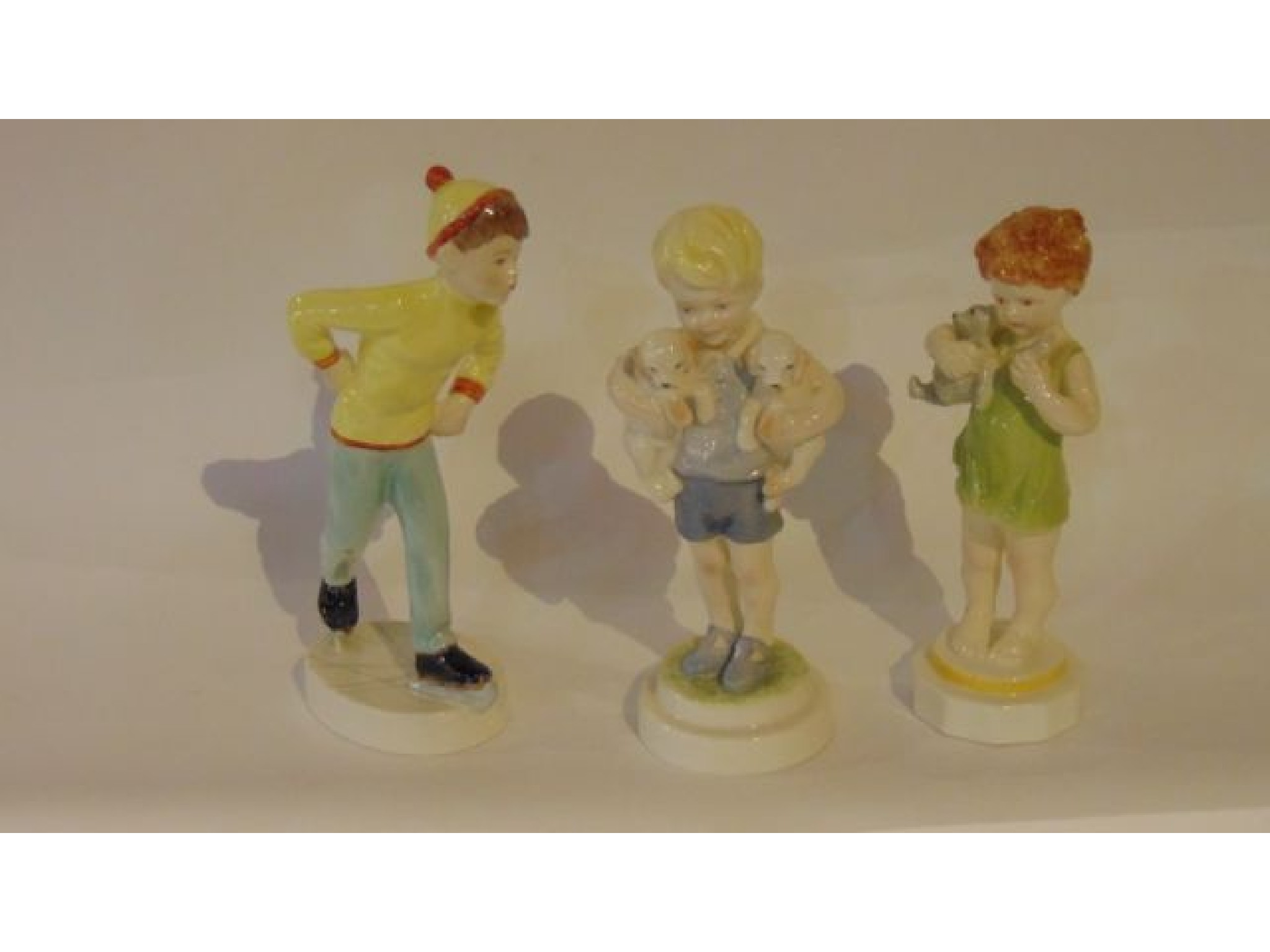 Appraisal: Three Royal Worcester figures - Mondays Child in the form