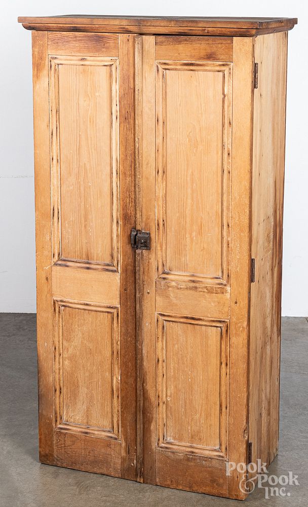 Appraisal: Pine paneled cupboard th c Pine paneled cupboard th c