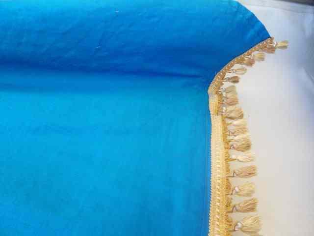 Appraisal: A PAIR OF COBALT BLUE SILK CURTAINS with gold silk