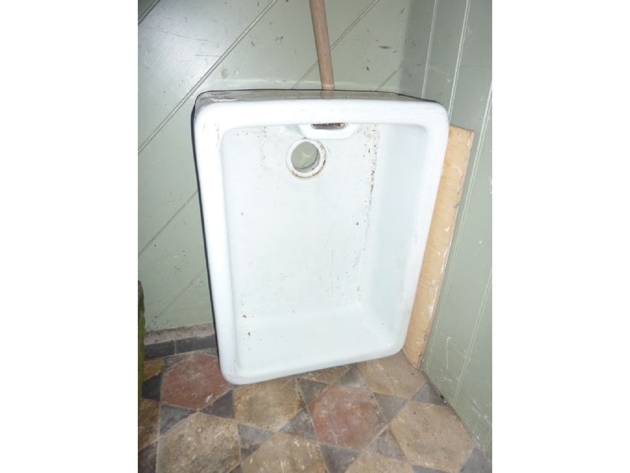 Appraisal: A white glazed ceramic butlers sink