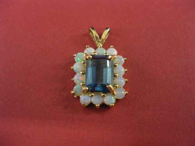 Appraisal: Opal Blue Topaz Pendant deep emerald cut London blue gem