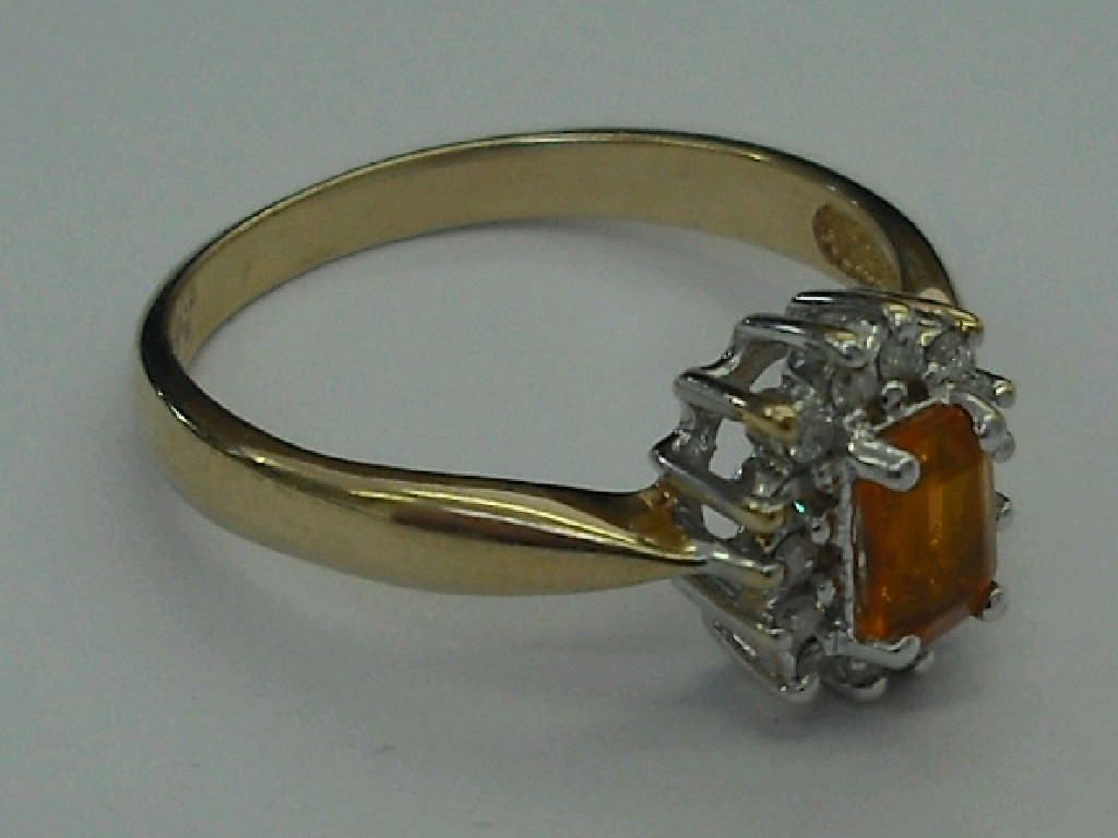 Appraisal: ct emerald cut fire opal and diamond cluster ring size