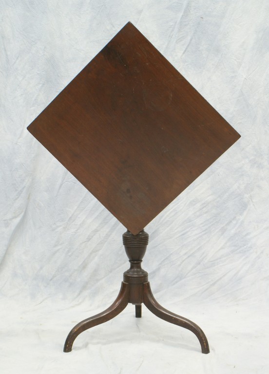 Appraisal: Mahogany tilt top candlestand square top over urn turned pedestal