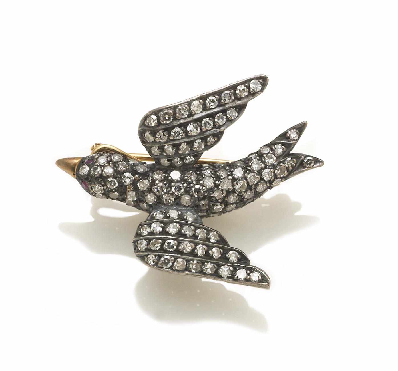 Appraisal: A diamond swallow brooch estimated total diamond weight carats mounted