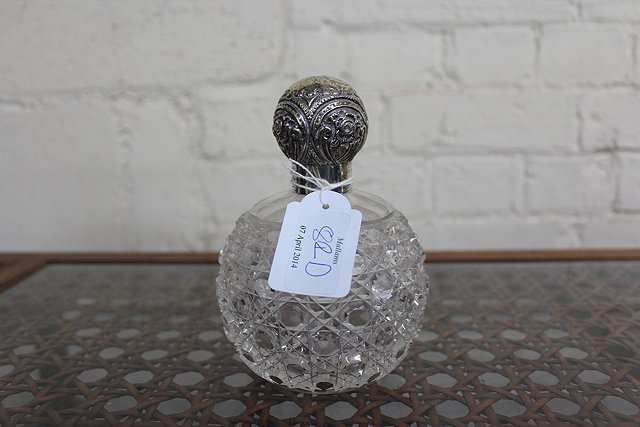 Appraisal: AN ANTIQUE GLOBULAR CUT GLASS SCENT BOTTLE with silver lid