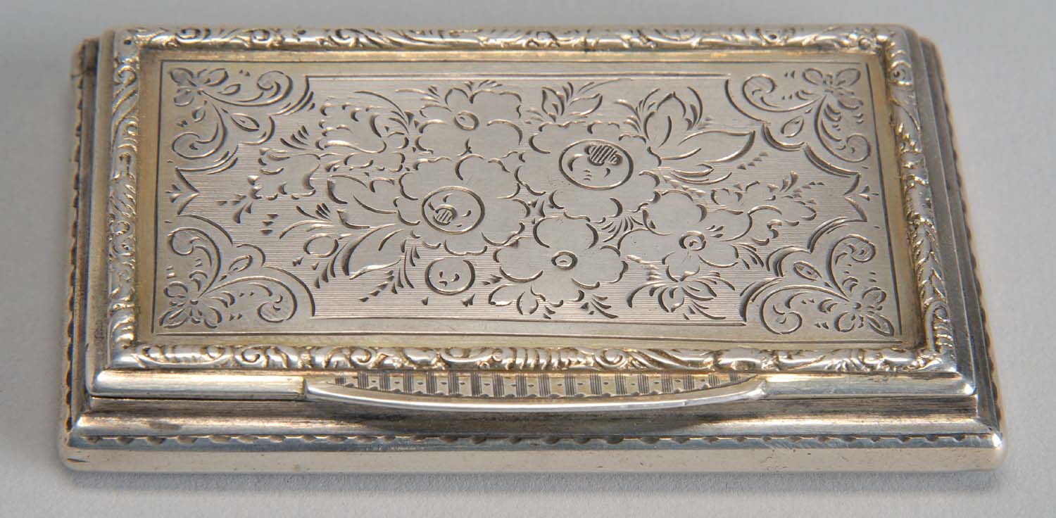 Appraisal: AUSTRIAN SILVER SNUFF BOX with engraved lid Continental marks on