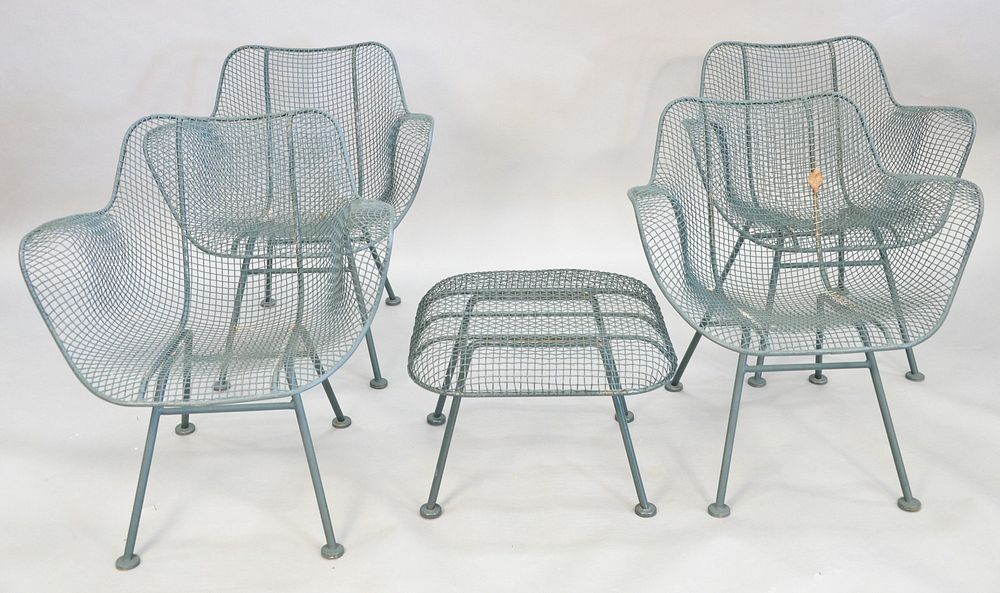 Appraisal: Set of four sculptura armchairs and footstool in green chairs