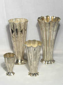 Appraisal: Three modern Persian silver vases with incised decoration bearing assay