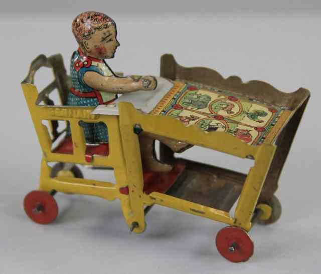 Appraisal: CHILD IN HIGH CHAIR PENNY TOY Fischer Germany lithographed tin