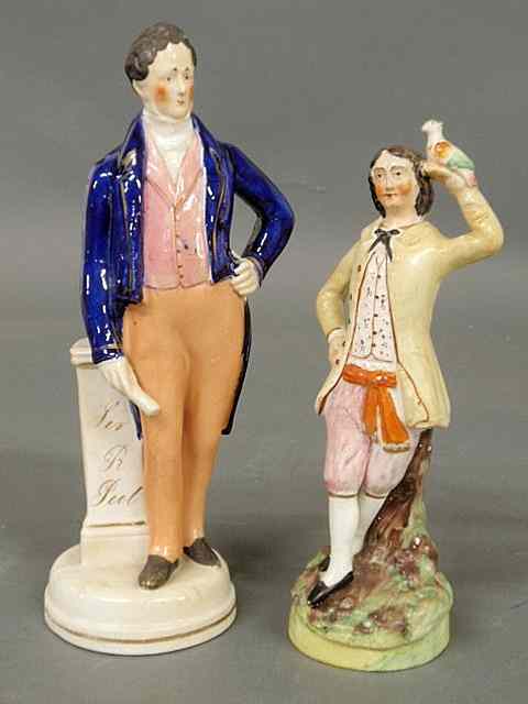 Appraisal: Two th c Staffordshire figures- Sir R Peel h and