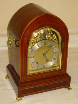 Appraisal: A MANTEL CLOCK the twin barrelled movement by Winterholder and