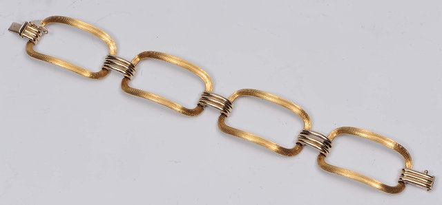 Appraisal: An ct two colour gold braceletof stylised form grams