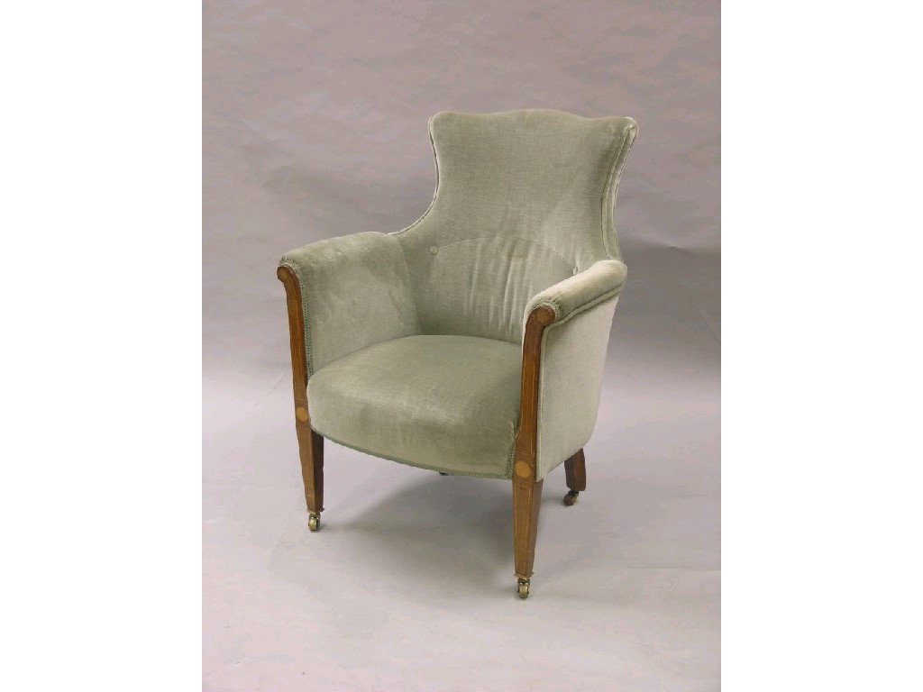 Appraisal: An Edwardian inlaid mahogany drawing room armchair upholstered in a