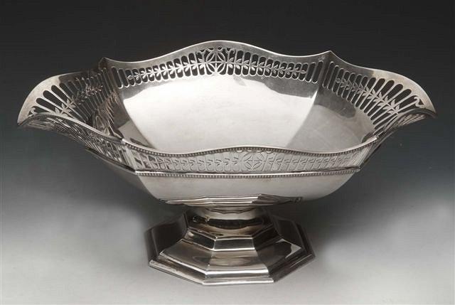 Appraisal: A SILVER CAKE BASKET with shaped and pierced sides with