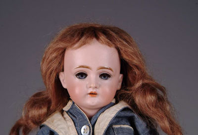 Appraisal: JDK DOLLY FACE Blue glass sleep-eyed Kestner open mouth doll