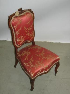 Appraisal: A LATE VICTORIAN SATINWOOD NURSING CHAIR with ebony stringing and