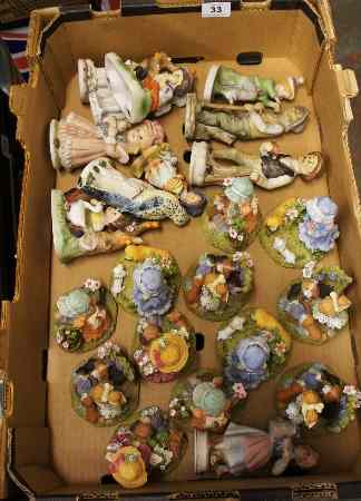 Appraisal: A collection of various pottery figures and resin children figures