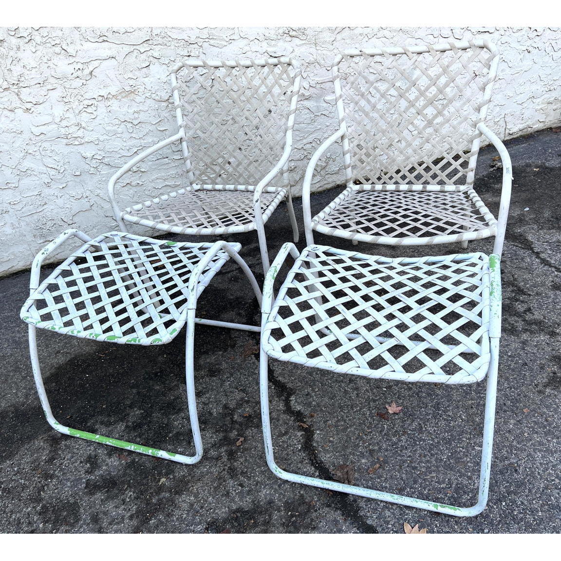 Appraisal: pc Outdoor Lounge Chairs Ottoman Stools Metal frames with woven