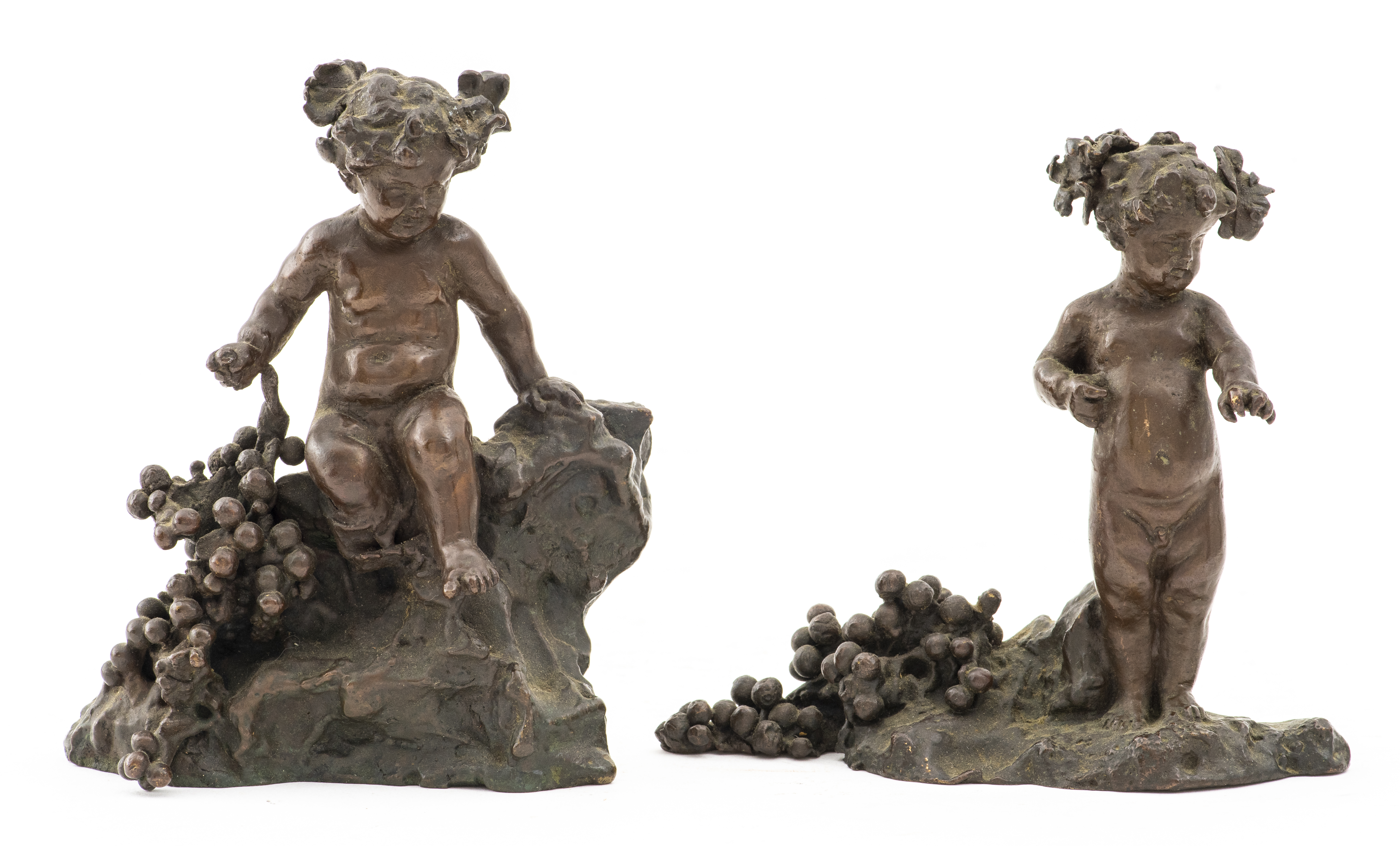 Appraisal: BRONZE PUTTI WITH GRAPES DESK ORNAMENTS PAIR Bronze putti with