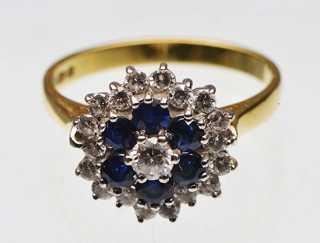 Appraisal: A SAPPHIRE AND DIAMOND SET DRESS RING in the form