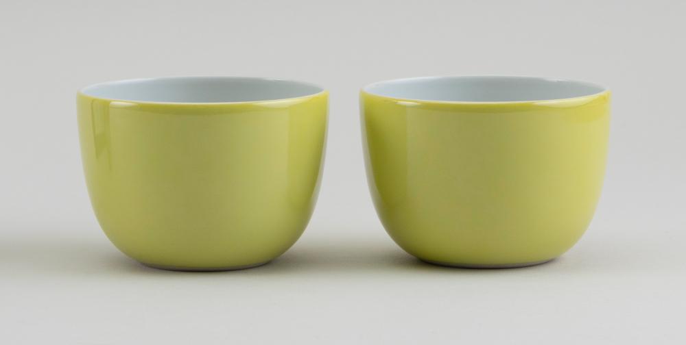 Appraisal: PAIR OF CHINESE IMPERIAL YELLOW PORCELAIN TEA BOWLS EARLY TH