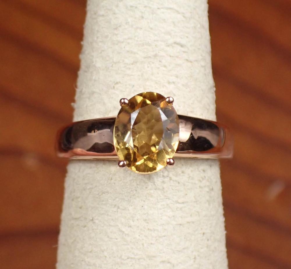 Appraisal: CITRINE AND FOURTEEN KARAT ROSE GOLD RING set with an