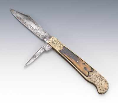 Appraisal: 's Brass and Horn Two-Blade Pocket Knife Highly decorated with