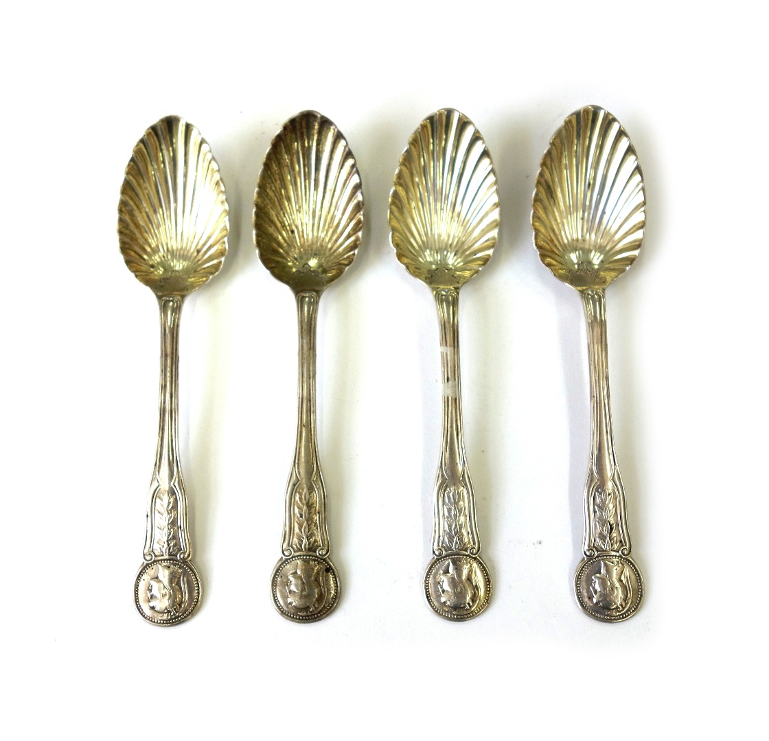 Appraisal: A set of four William IV cast silver fruit spoons