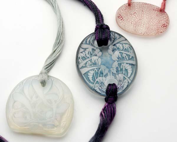 Appraisal: RENE LALIQUE Etc Three pendants Gui in opalescent glass Guepes