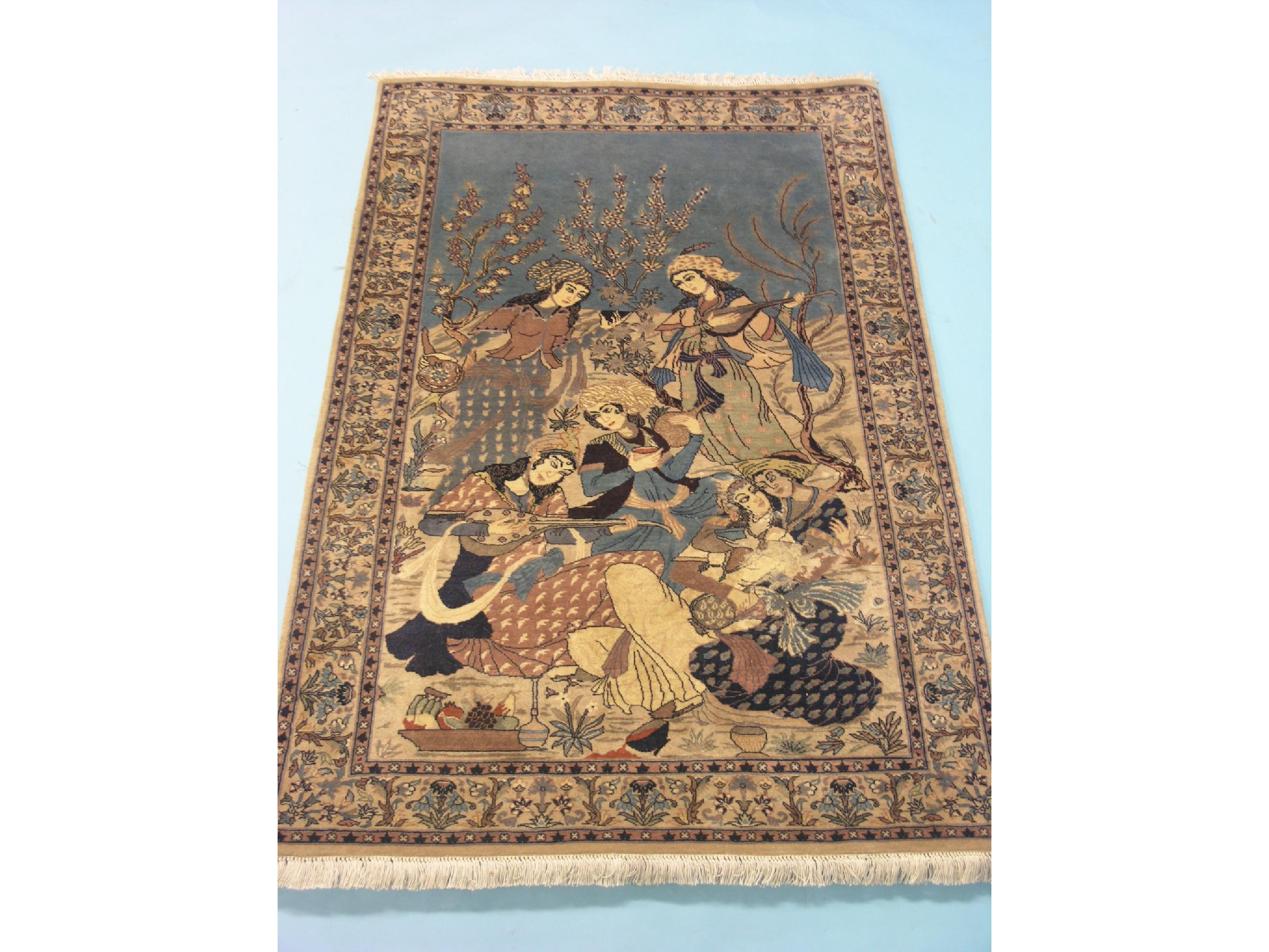 Appraisal: An Eastern wool rug finely-knotted design of musician figures predominantly