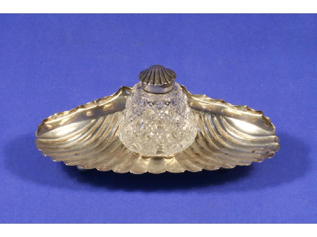 Appraisal: A VICTORIAN INKWELL modelled in the form of a shell