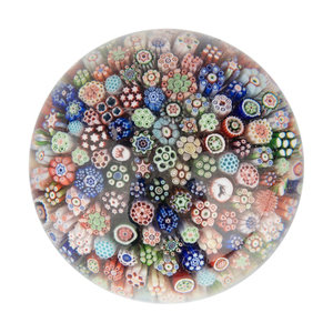 Appraisal: A Miniature Baccarat Close Packed Millefiori and Silhouette Glass Paperweight