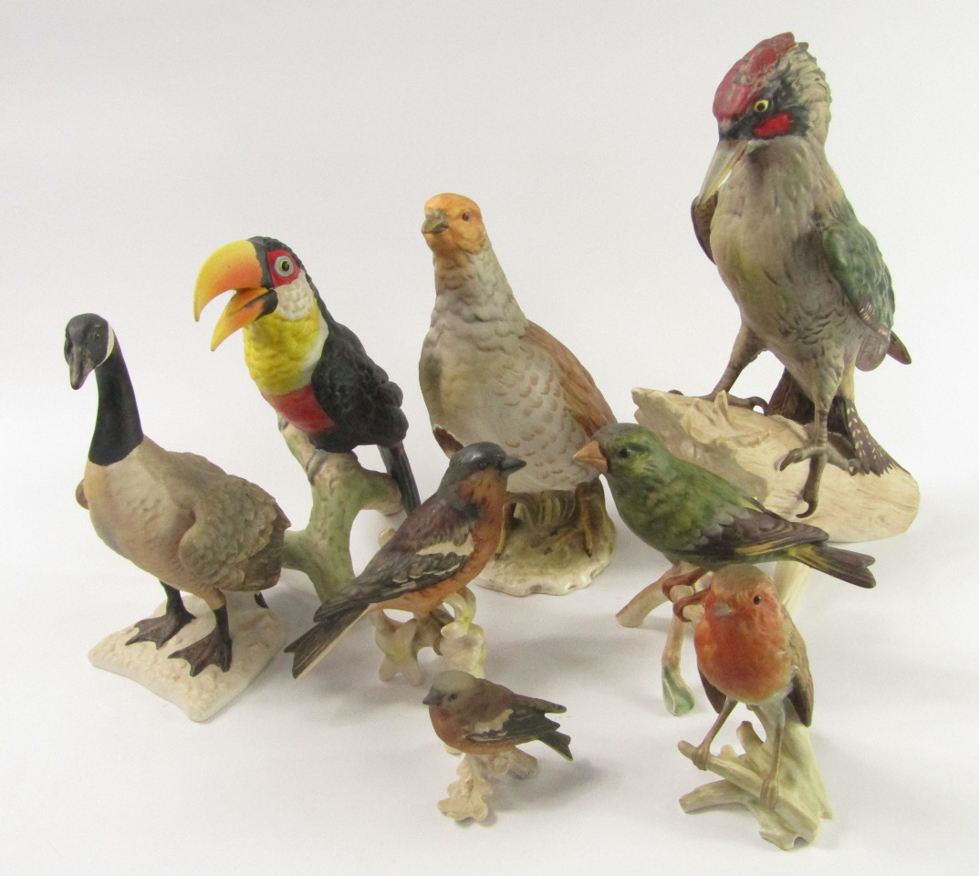 Appraisal: W Goebel bird sculptures comprising Robin Green Billed Toucan Green