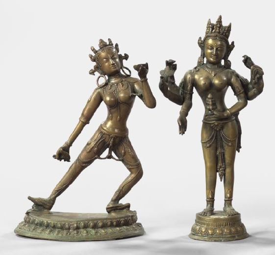 Appraisal: Two Cast-Bronze Figures consisting of a Nepalese cast-bronze figure of