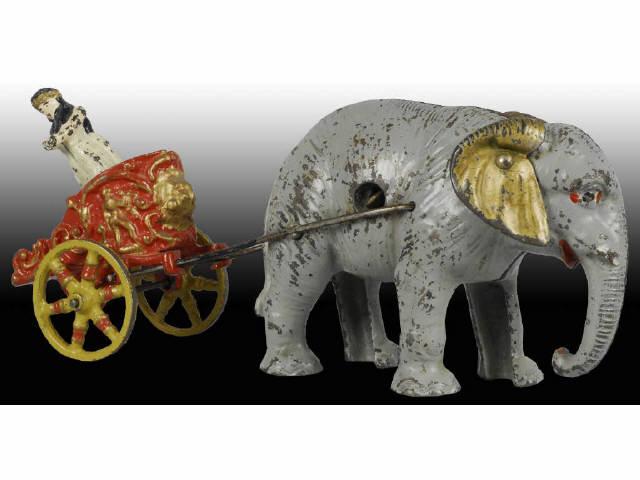 Appraisal: Cast Iron Large Elephant with Chariot Still Bank Description Chariot