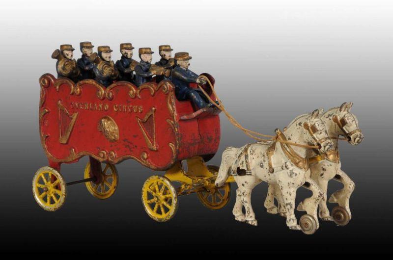 Appraisal: Cast Iron Overland Band Wagon with Figures Description Made by