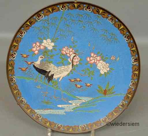 Appraisal: Cloisonn charger th c with floral and bird decoration on