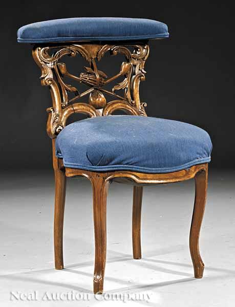 Appraisal: An Italian Carved Walnut Smoker's Chair late th c padded