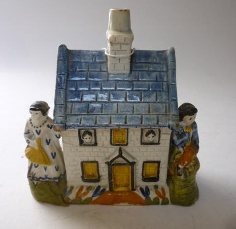 Appraisal: A PRATTWARE MONEY BOX late th century modelled as a