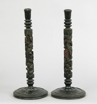 Appraisal: A Pair of Carved Bamboo Candlesticks Designed with long shafts