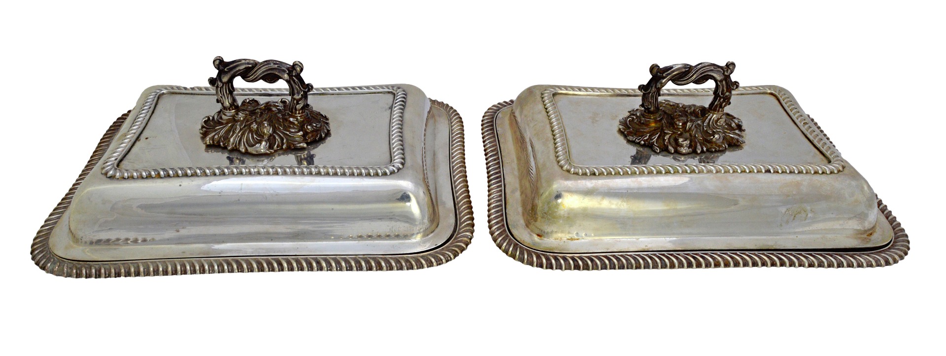 Appraisal: A pair of silver shaped rectangular lidded entree dishes each