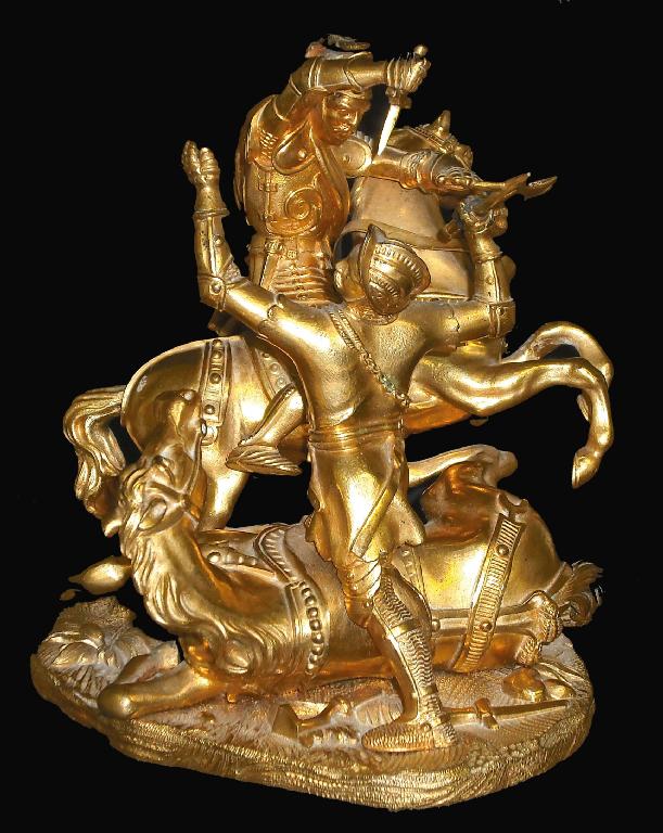 Appraisal: Gilt metal figural group depicting two battling knights on horseback