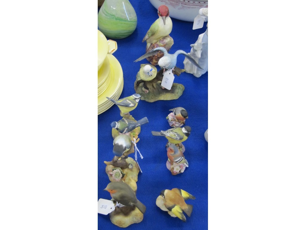 Appraisal: Nine Royal Worcester and Royal Crown Derby porcelain figures of