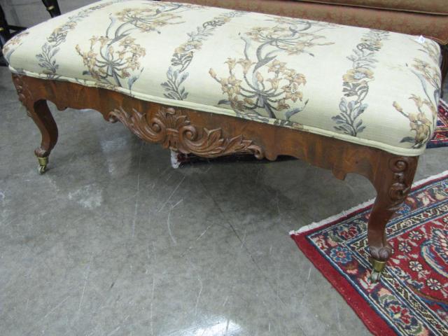 Appraisal: Early Victorian Upholstered Walnut Bench with castor upholstery is stained