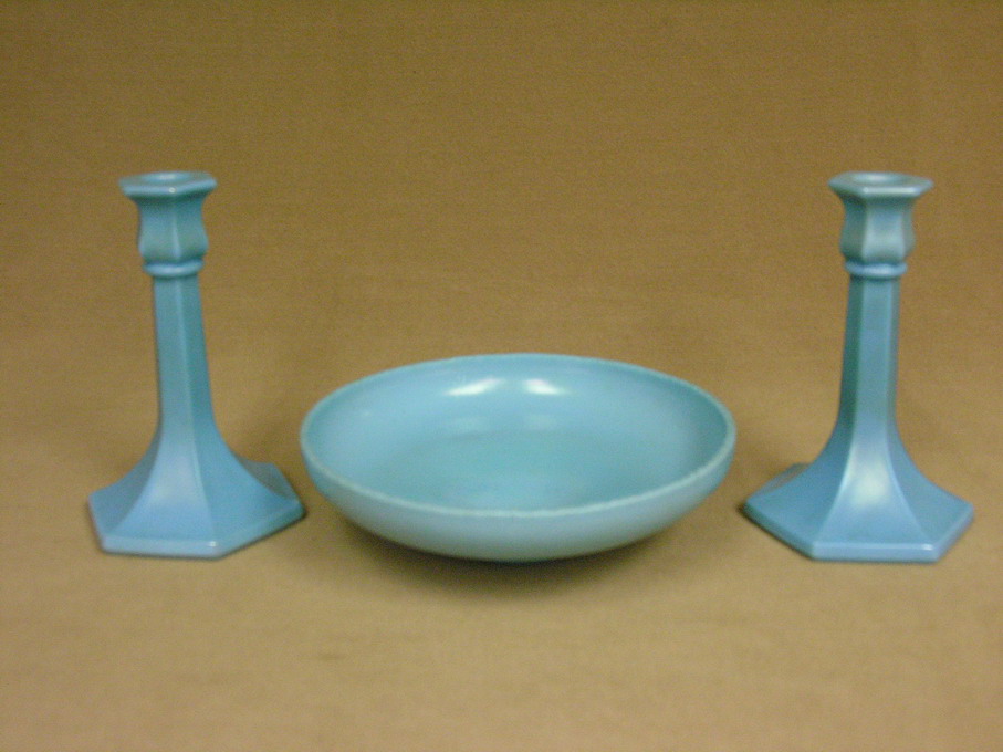 Appraisal: STRETCH GLASS BOWL AND CANDLEHOLDERS Stretch glass bowl - Size